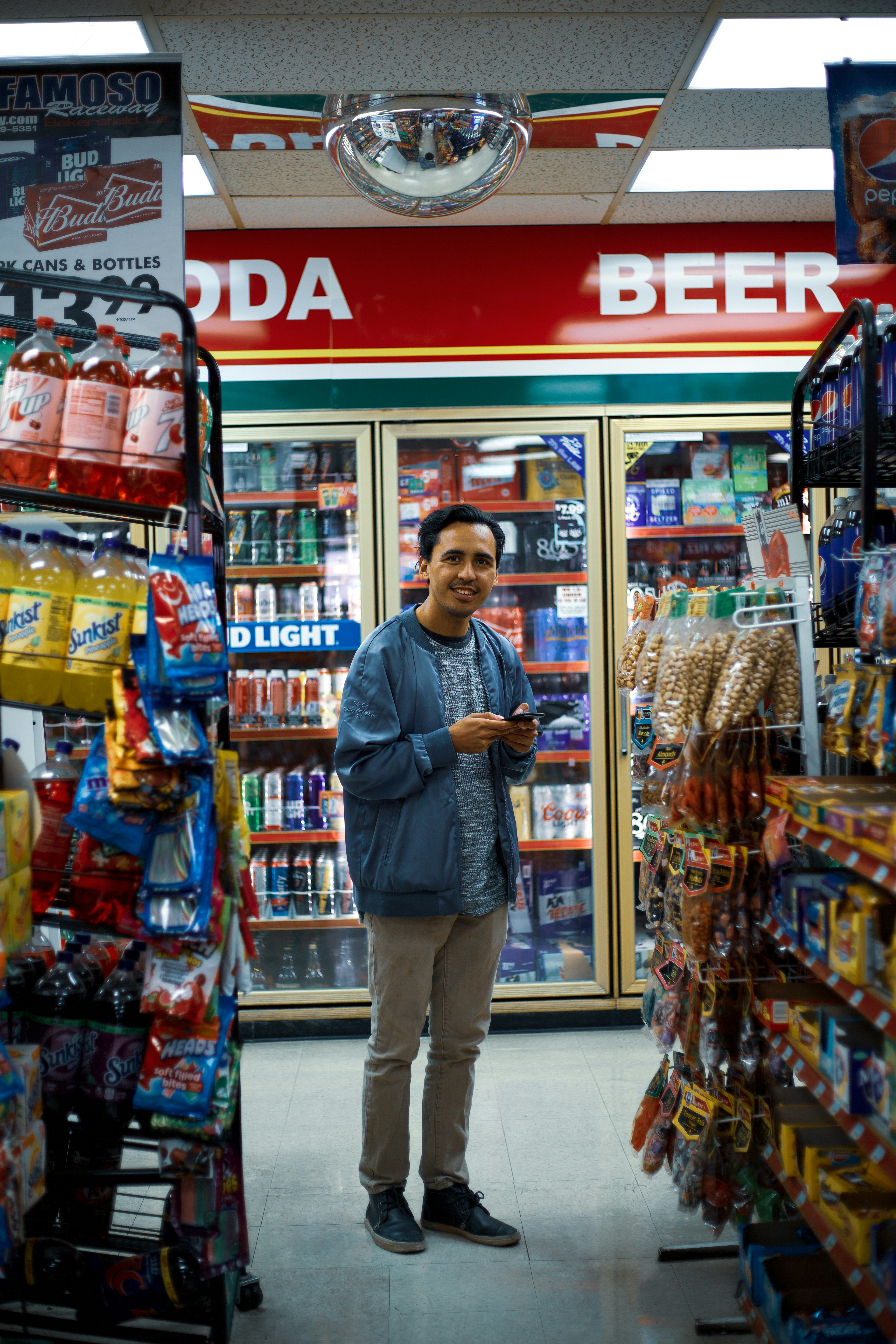 a man buying groceries in a shop